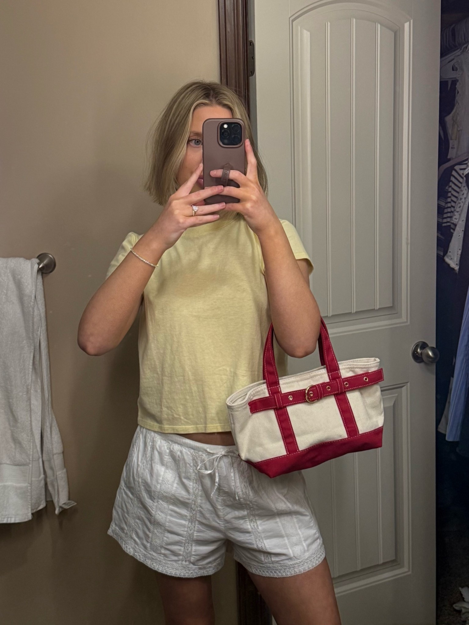 My yellow Gap tee is sold out, but it still comes in pink! Linked other cute yellow tee options
Abercrombie white cotton shorts (Linked others in case your size isn’t in stock)
Target canvas mini belted tote bag
Revolve tennis bracelet

#LTKootd