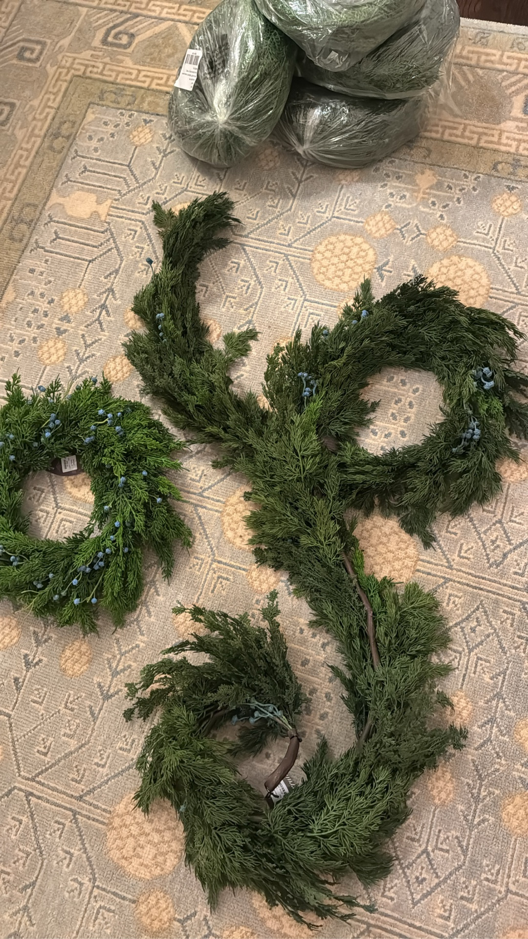 Elevate your staircase and mantels with this gorgeous faux garland from Terrain. #TerrainPartner

#LTKSeasonal #LTKHome #LTKHoliday