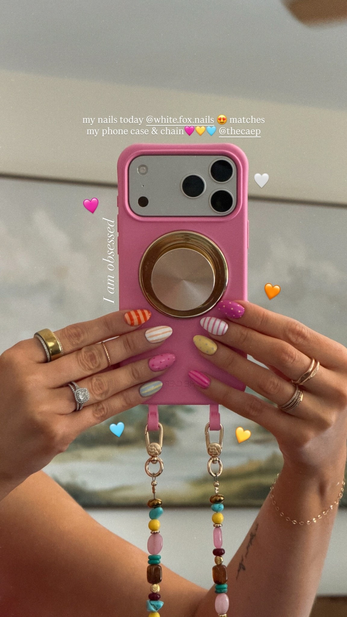 my nails today @white.fox.nails 😍 matches my phone case & chain🩷💛🩵 @thecaep  I am obsessed 🧡 🩵 🩷 💛 🤍