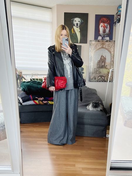 These trousers look like a long skirt when I stand like this. I paired them with my oversized Nirvana knit sweater, and oversized leather breaking the rule of wearing something slim to balance the oversized 🤷‍♀️ my little grey boy and I are colour coordinating today.
Handbag is vintage.
•
.  #summerlook  #torontostylist #StyleOver40  #nirvana #secondhandFind #fashionstylist #FashionOver40  #vintageprada #MumStyle #genX #genXStyle #shopSecondhand #genXInfluencer #WhoWhatWearing #genXblogger #secondhandDesigner #Over40Style #40PlusStyle #Stylish40s #styleTip  #secondhandstyle 


#LTKstyletip #LTKSeasonal #LTKover40