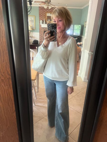 Cream colored open weave sweater, wide leg jeans! Use my code CARLA10 to save on sweater. Sweater comes in 3 different colors.

#LTKsalealert #LTKSeasonal