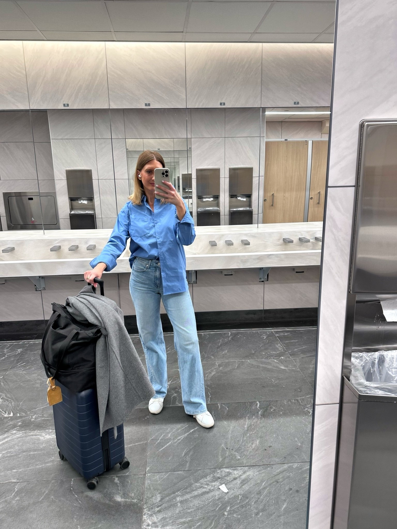 Travel day outfit - this button down from Athleta is so stretchy. Just got this new blue color yesterday. Also have the black and white - wearing a small

#LTKootd #LTKfitnessgoals #LTKTravel