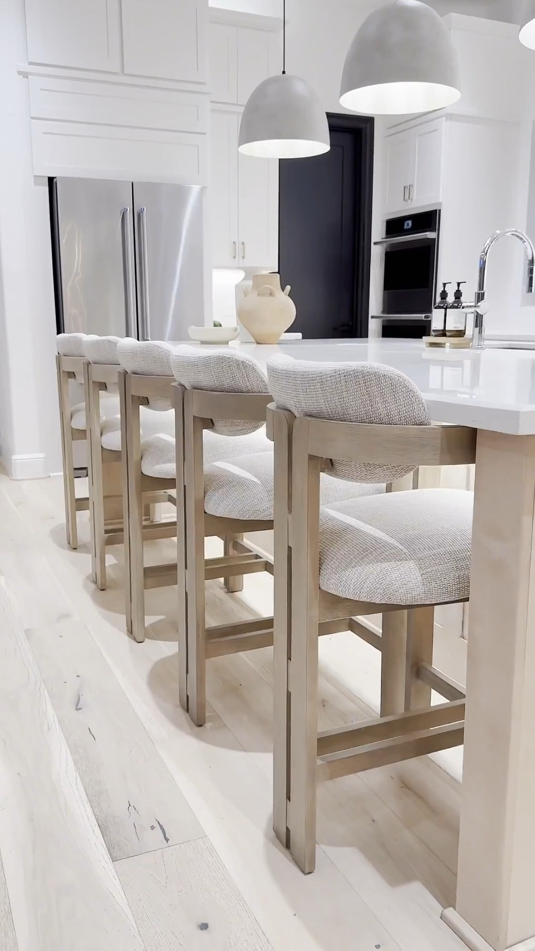 Ok before we discuss this gorgeous find I need to emphasize: This stool ALWAYS sells out! 😖  It’s back in stock so get it now! 🥰

This beauty looks just like the $1,100 version from Arhaus, & I grabbed mine for only $230 🤯…a steal! The shape is nearly identical, and I love that it blends seamlessly into my space.

It comes in 3 gorgeous colors…. I went with the natural beige, and I’m obsessed. 😍 Love the clean lines and subtle curves while adding the perfect neutral touch.

I’ve been on the hunt for the perfect neutral counter stool for YEARS & I’m happy to share this unbeatable deal with you 🫶🏽🥰🫶🏽

….so if you’ve been looking for a neutral counter stool that suits your Organic Modern vibe, this is it! 😊