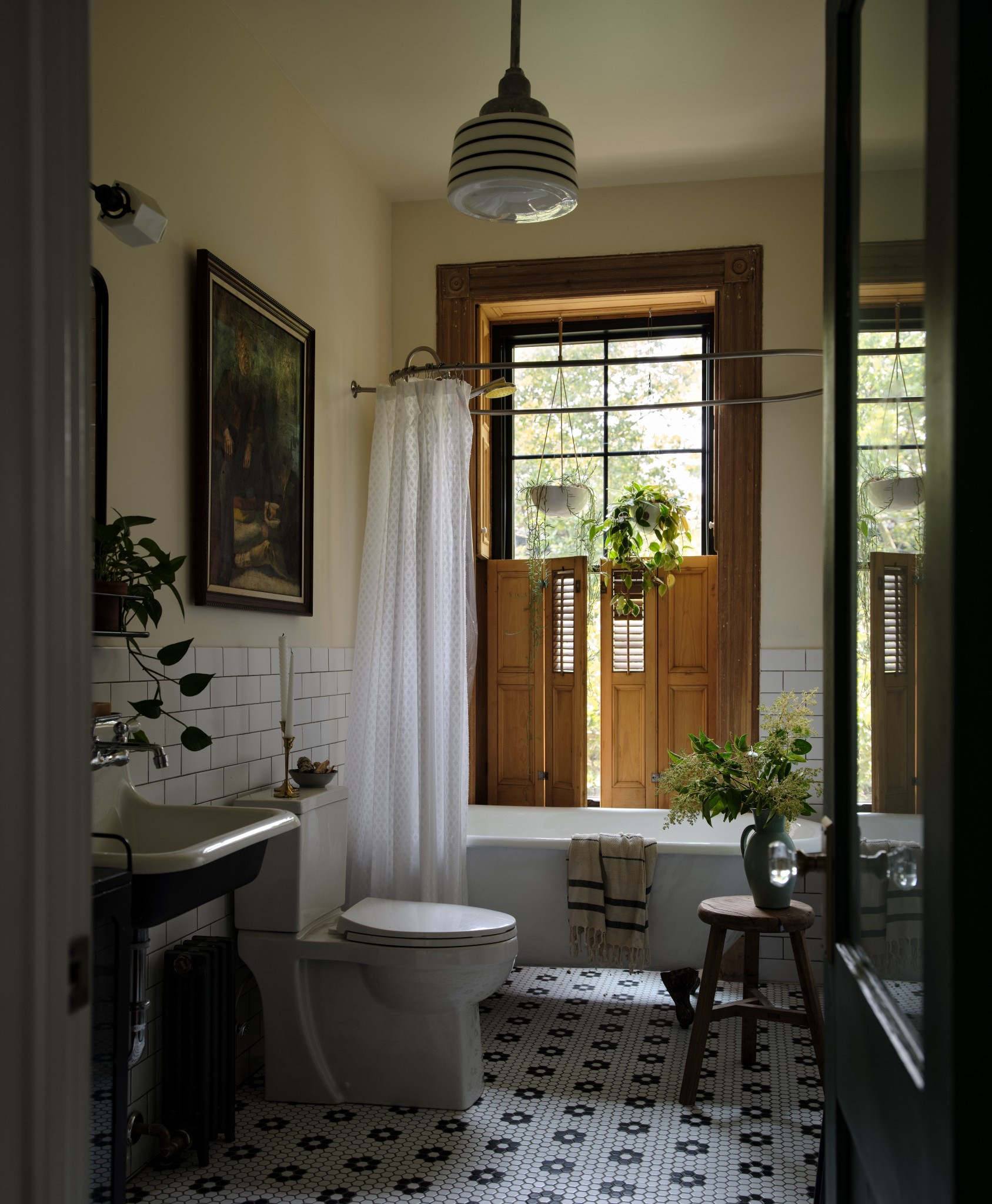 Our guest bathroom! We wanted to embrace a historic and charming vibe. ✨🤎