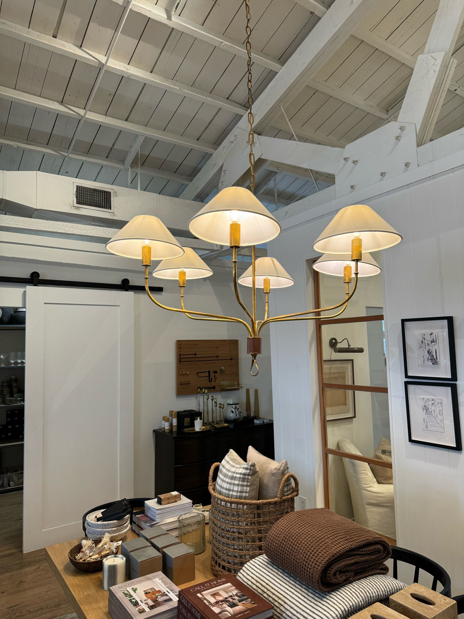 Amber Interiors, black chandelier brass chandelier, woven basket shade chandelier pottery barn

#LTKhome #LTKSpringSale