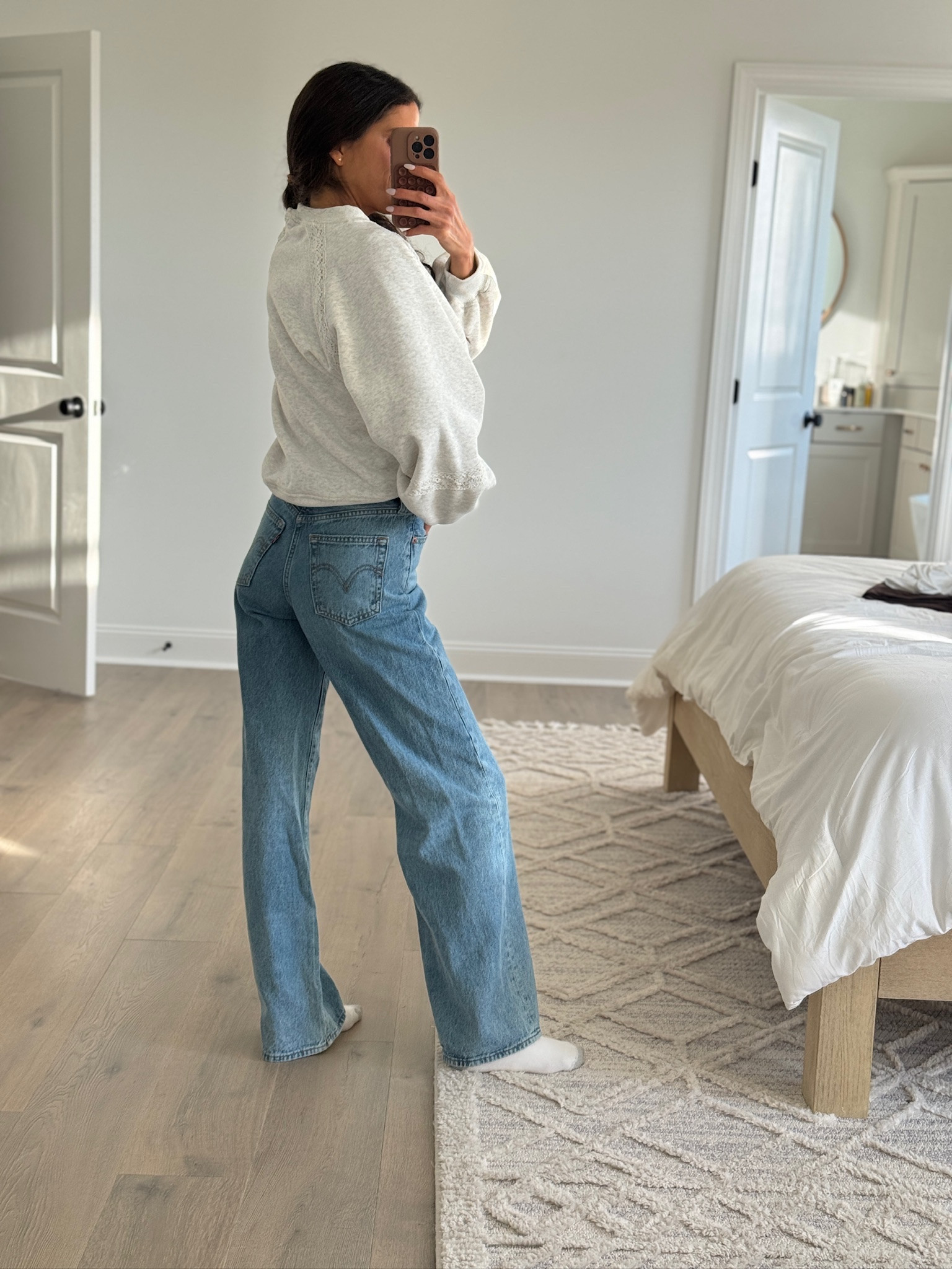 Casual everyday outfit with a cozy neutral sweatshirt and relaxed straight leg jeans. Easy, comfortable look that works for school drop off, errands, travel days, or casual weekends. Soft layering piece paired with classic denim for an effortless, lived-in style. Neutral sweatshirt outfit, straight leg jeans, casual mom outfit, everyday casual wear, cozy fall outfit, relaxed fit denim, simple outfit ideas, comfortable daily style.

#LTKootd #LTKSeasonal #LTKFindsUnder50