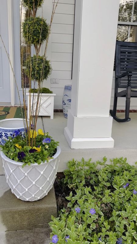 Front porch decor. My rocking chairs I’ve had to 6 years they have held up so well and currently on SALE 20% off! Faux topiaries for the win. White plant containers. 

#LTKsalealert #LTKSeasonal #LTKhome