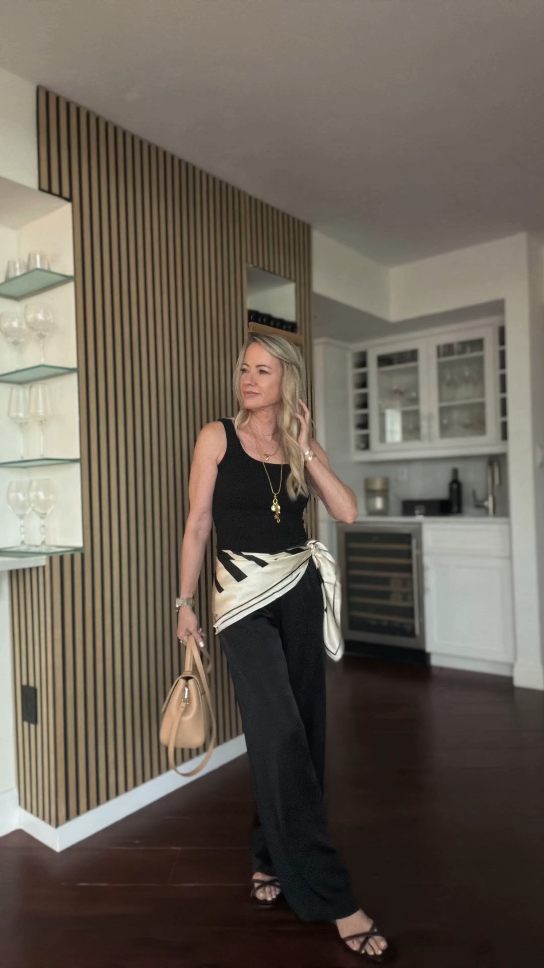 A simple black outfit is always a good idea… it’s the styling that makes it feel special. ✨ I added a silk scarf, layered gold jewelry, and a structured bag for an effortless, elevated look. Everything is linked in my LTK.

#LTKootd #LTKgrwm #LTKOver40