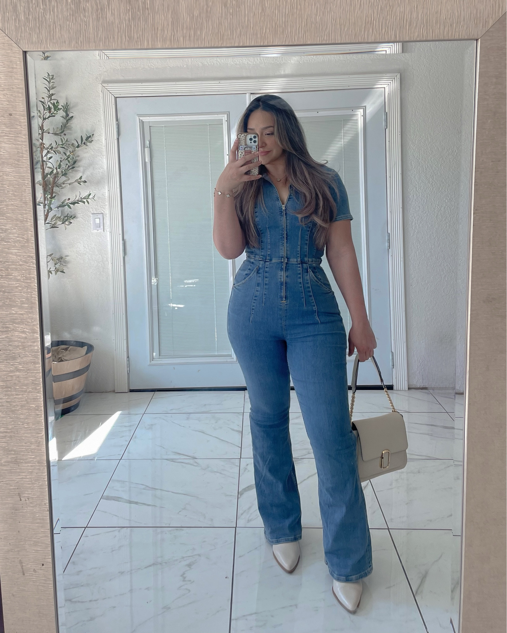 Most flattering jumpsuit ever!
Free people jumpsuit  freepeople rodeo fashion rodeo season cowboy boots 

#LTKshoecrush #LTKSeasonal #LTKstyletip