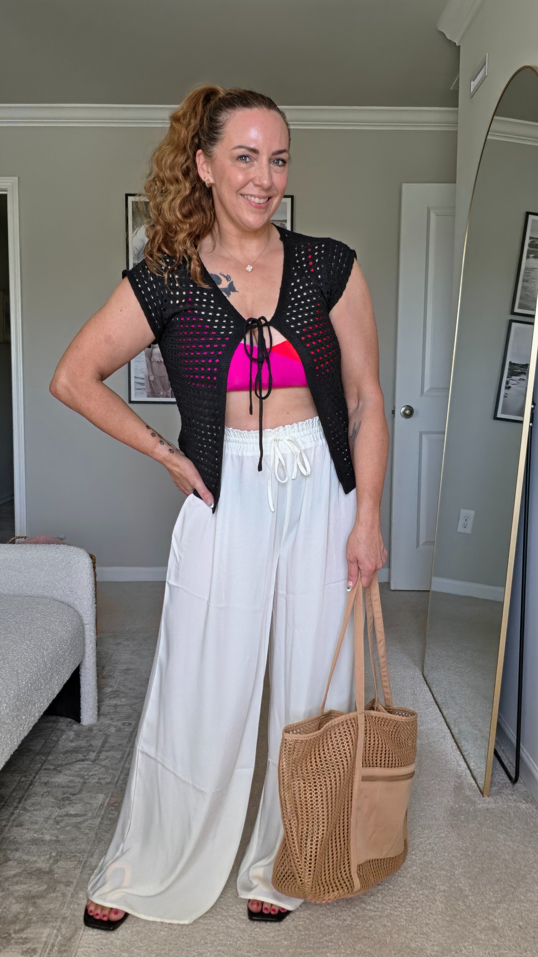 This black crochet tie-front top is the perfect lightweight layer to throw over a bikini or crop top. Its delicate open-knit design adds an effortless boho touch to any beach-ready look.#beachcoverup #crochetstyle #amazonfinds #summerfashion

#LTKTravel #LTKSwim #LTKootd