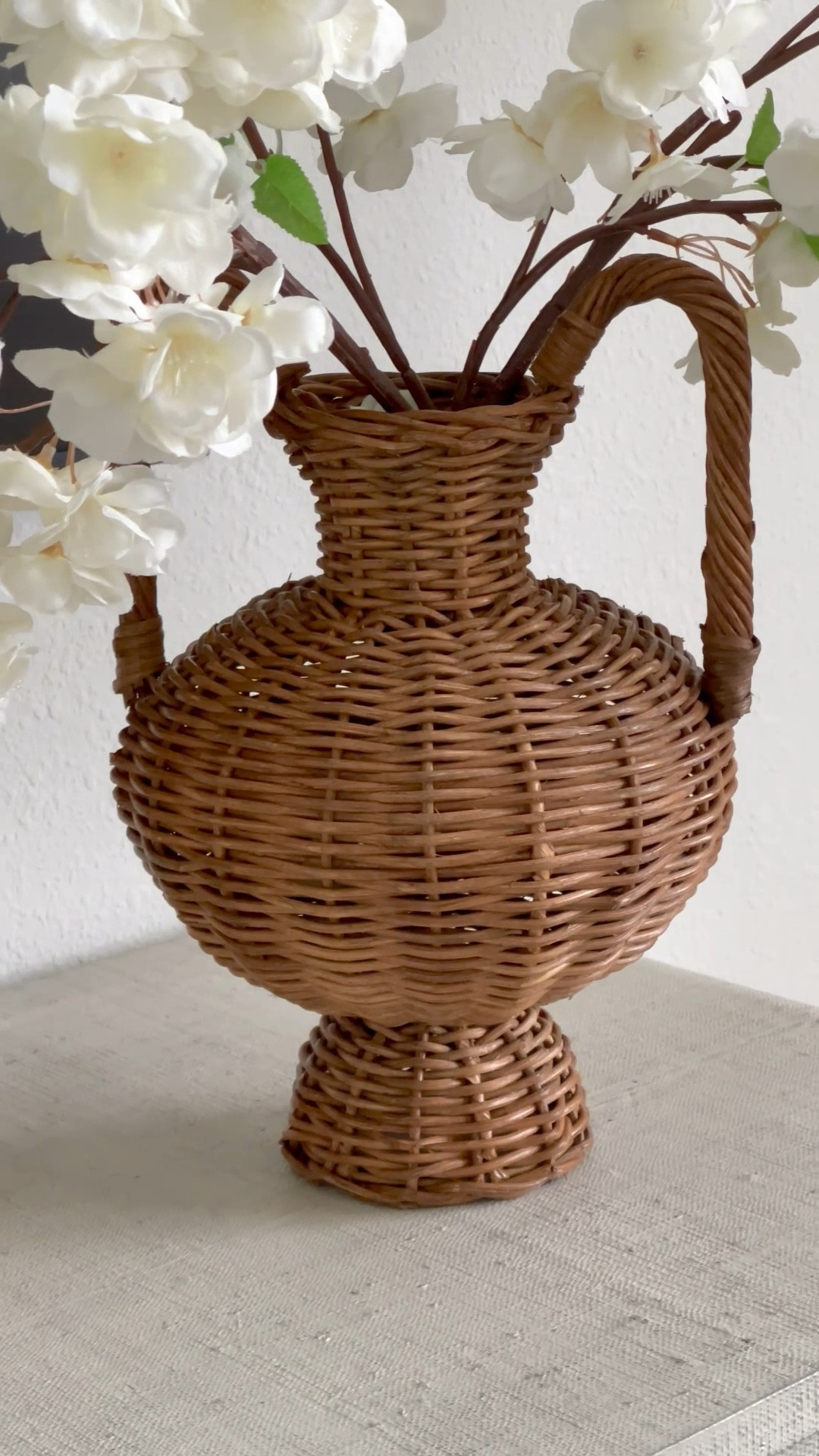 I’m so in love with this budget friendly rattan vase at only $39!  I also linked a more high end one but they are roughly the same size and color so why not go for the more budget friendly one, right?!.  Love them both though and the high end one is 30% off right now!!
