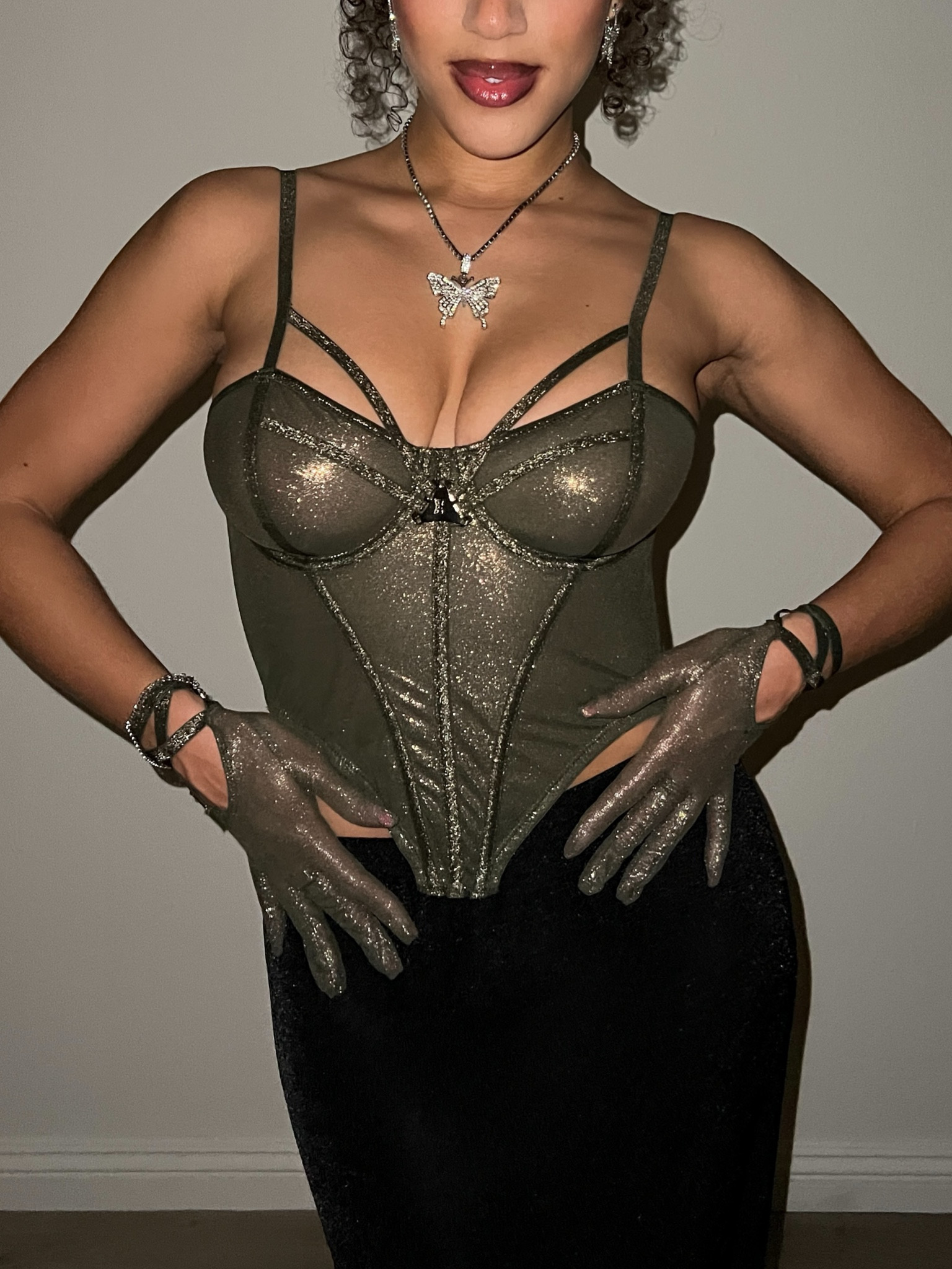 NYE outfit idea, glittery outfits, corset tops, metallic corset, lingerie as outfits, dark feminine style, New Year’s Eve outfits