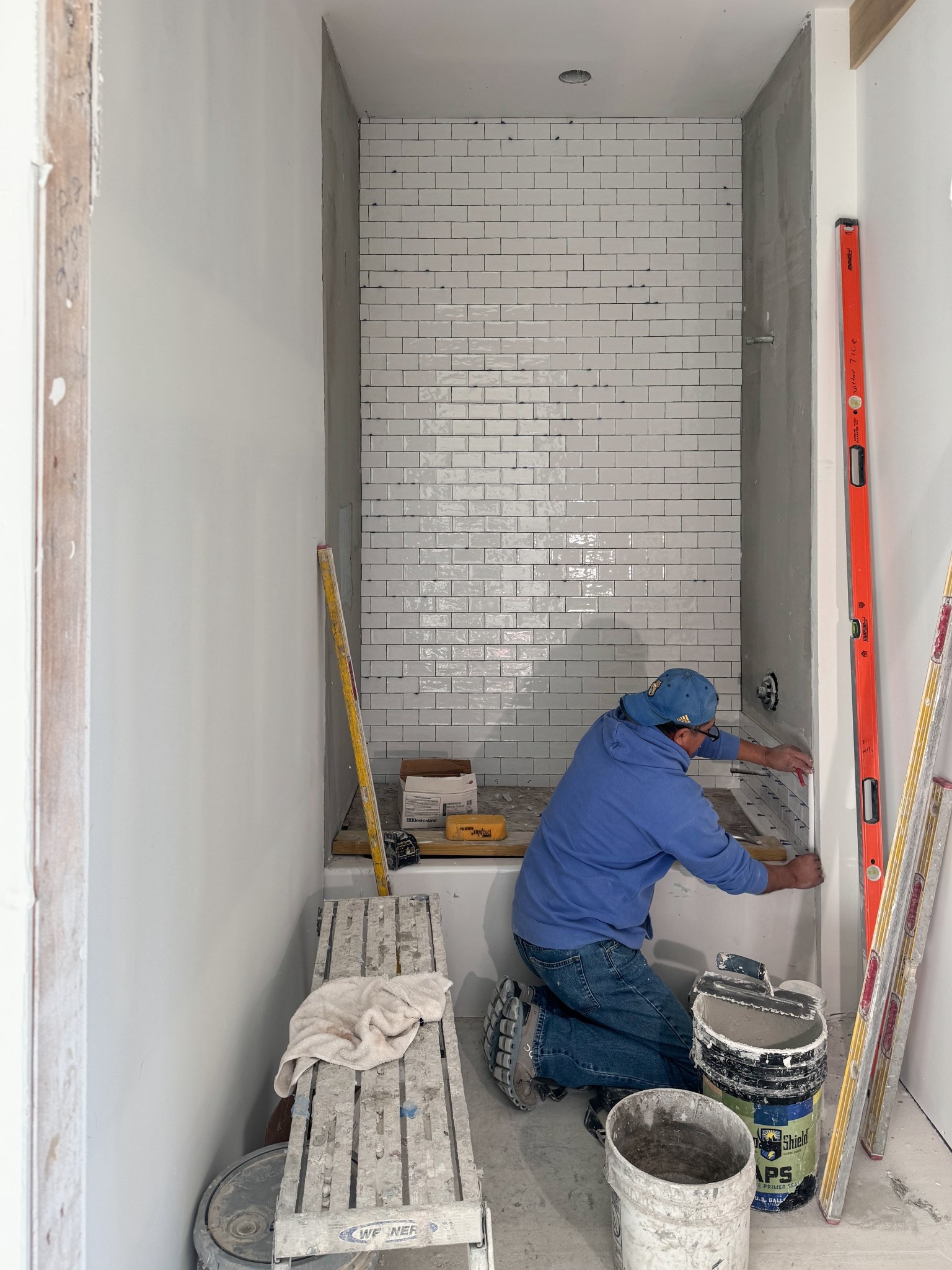 Loving this tile that’s getting installed in our guest bathroom! The color is pearl white and the finish is so beautiful! #ltkhome 

#LTKdayinmylife #LTKSeasonal #LTKHome
