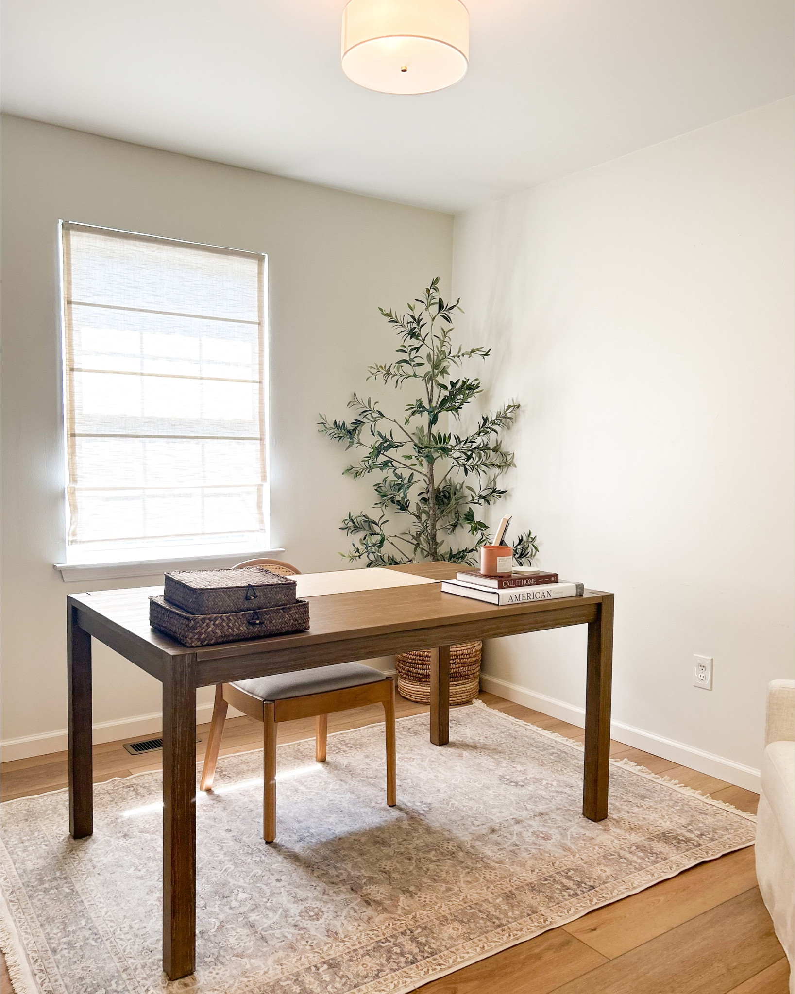 Home office views. 🤎 I have some big plans for this space, but it has already come such a long way. We recently installed new flooring in here and I love the warmth it brings to the space. 🤌🏻

Roman shades: Jawara Linen Roman Shades from Two Pages 

#LTKHome #LTKStyleTip