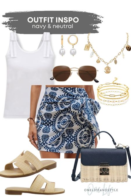 Navy and neutral outfit inspo with this floral print wrap skirt  

#LTKFindsUnder50 #LTKSeasonal #LTKStyleTip