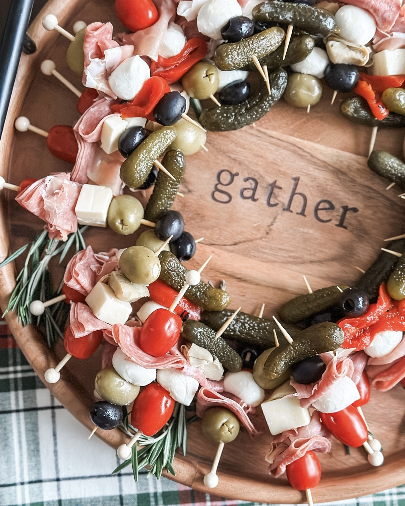 Still obsessed with this Christmas wreath charcuterie board from last year… so she’s coming with me to a holiday “bring your own board” party this weekend! 🎄

Mini skewers loaded with meats, cheeses, olives & veggies arranged on top of rosemary sprigs to make it the easiest festive snack. Save this idea for your holiday celebrations & take a peek at my stories to watch me make this board.

#LTKHome #LTKfoodie #LTKHoliday
