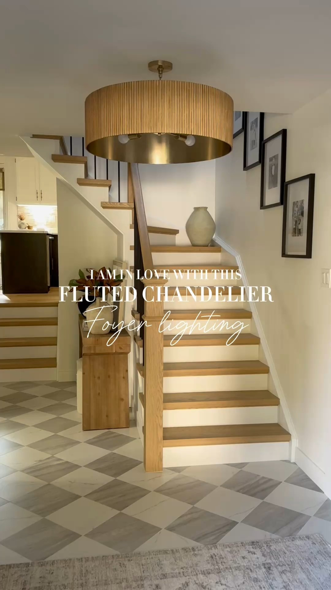 I AM IN LOVE🫶🏼

This dimmable, 4 light, adjustable, matte brass, mango wood chandelier in white wash couldn’t be more gorgeous. It was the perfect finishing piece in the foyer. It really gives that ‘wow factor’ when you enter our home👌🏼

I struggled to find the perfect light fixture since our entry way only has 8 foot ceilings. I wanted something over sized that added a little drama (but it had to fit) this was no easy task. Then I came across this beauty and it is adjustable, so I was able to hang it up high enough that it works🙌🏼 If you have taller ceilings it comes with a chain so you can choose the height that works best for you.

#foyer #foyerdesign #chandelier #lightfixture #lighting #modern #transitional #fluted #light #homedecor #homeinspo #neutralhome #cozyhome #interiordesign #foyerinspo #stylingideas #homefind

#LTKHome #LTKStyleTip