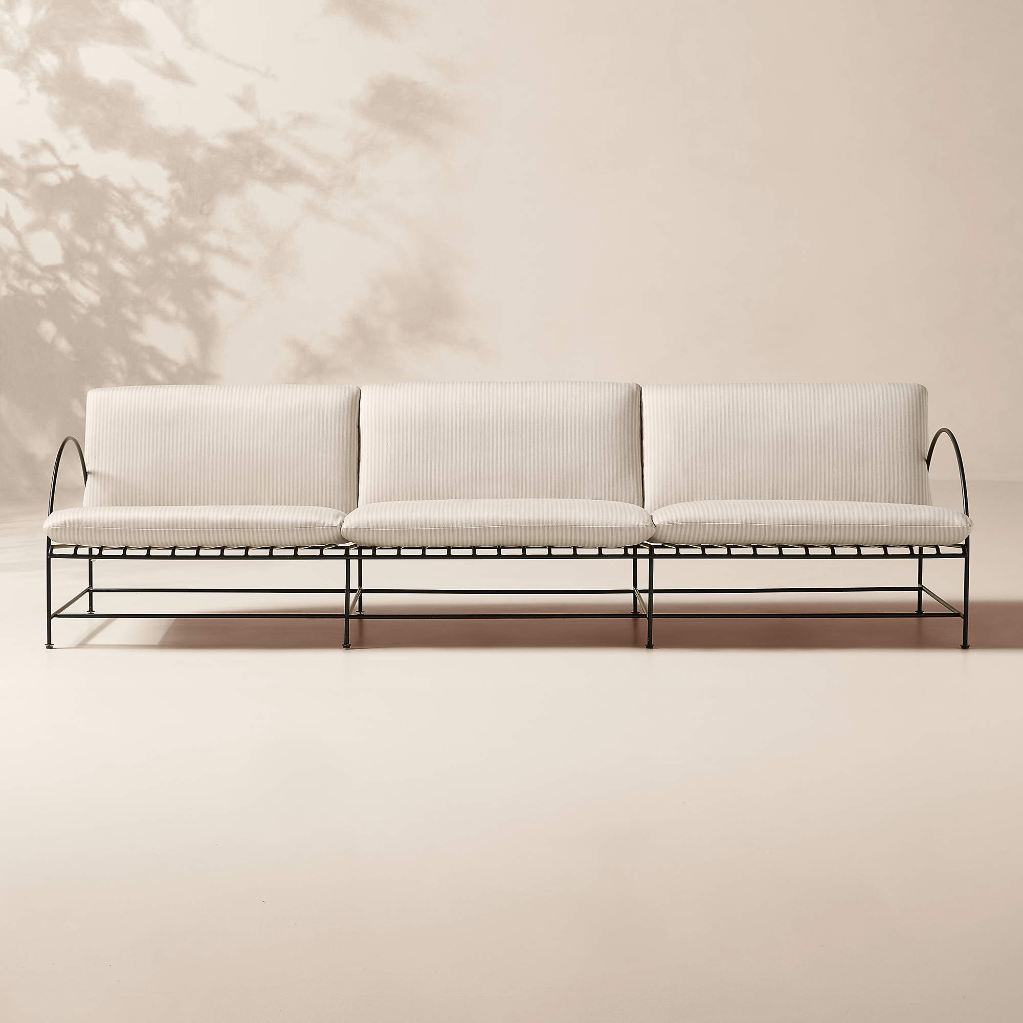 Costa 97" 3-Seat Black Metal Outdoor Sofa with Natural And White Striped Sunbrella Cushions + Rev... | CB2