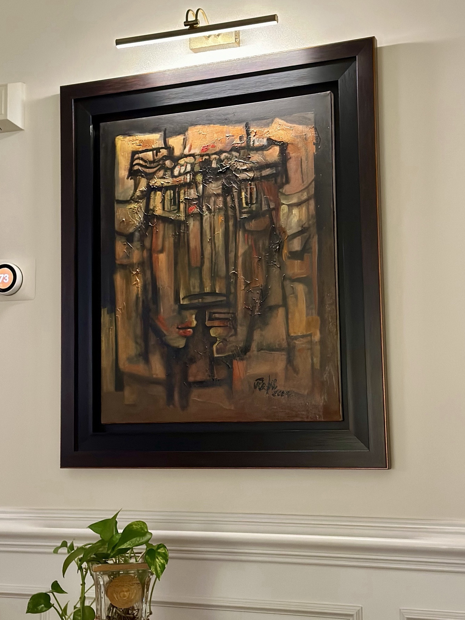 Perfect battery-operated picture light. Hassle-free installation, and it looks even better in person. 

#LTKSeasonal #LTKsalealert #LTKhome