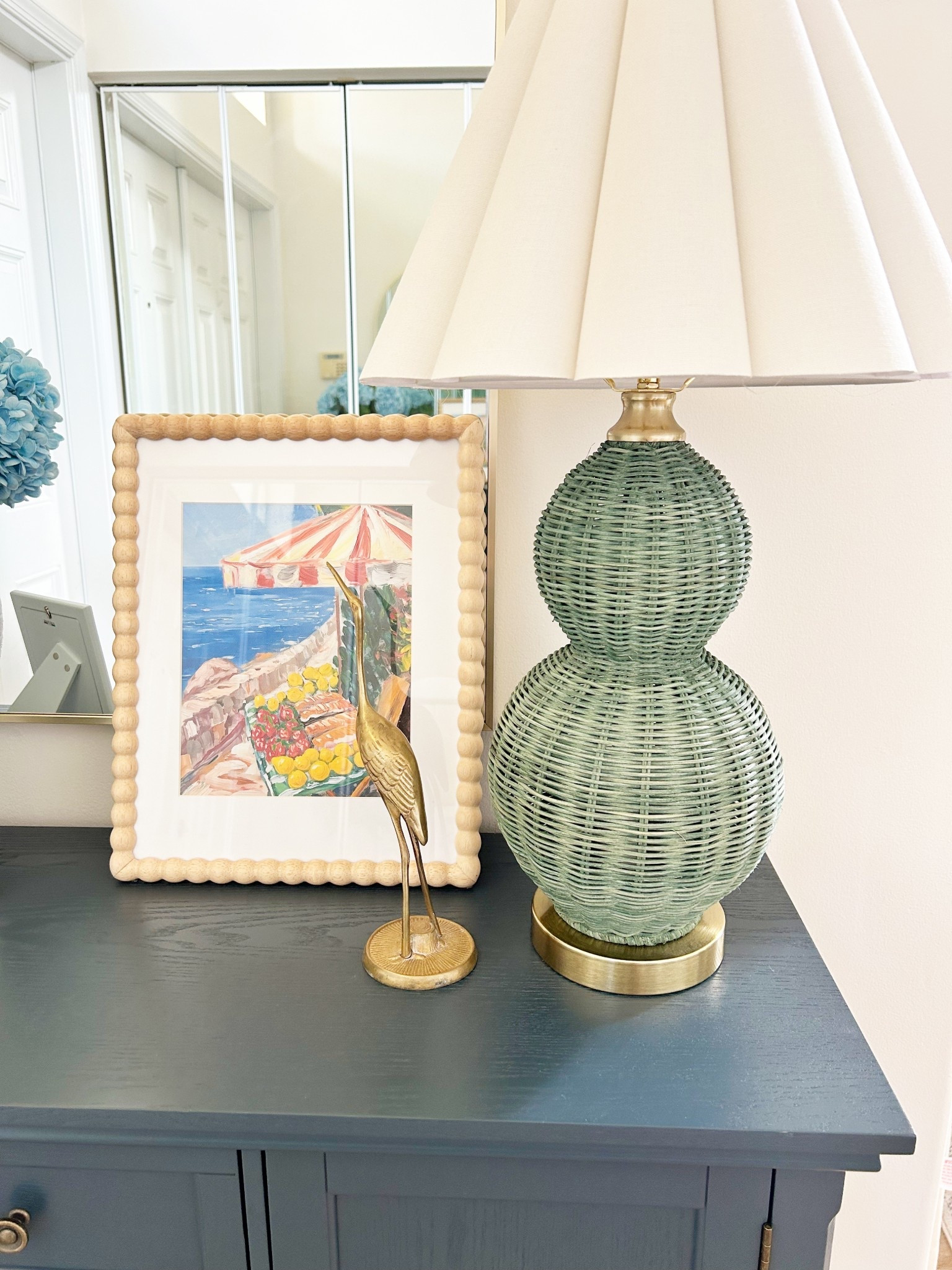 Love this little bright corner in my entryway. The lamp shade is one of my favorite purchases. Linking some similar lamp bases  

#LTKHome #LTKSaleAlert #LTKdayinmylife