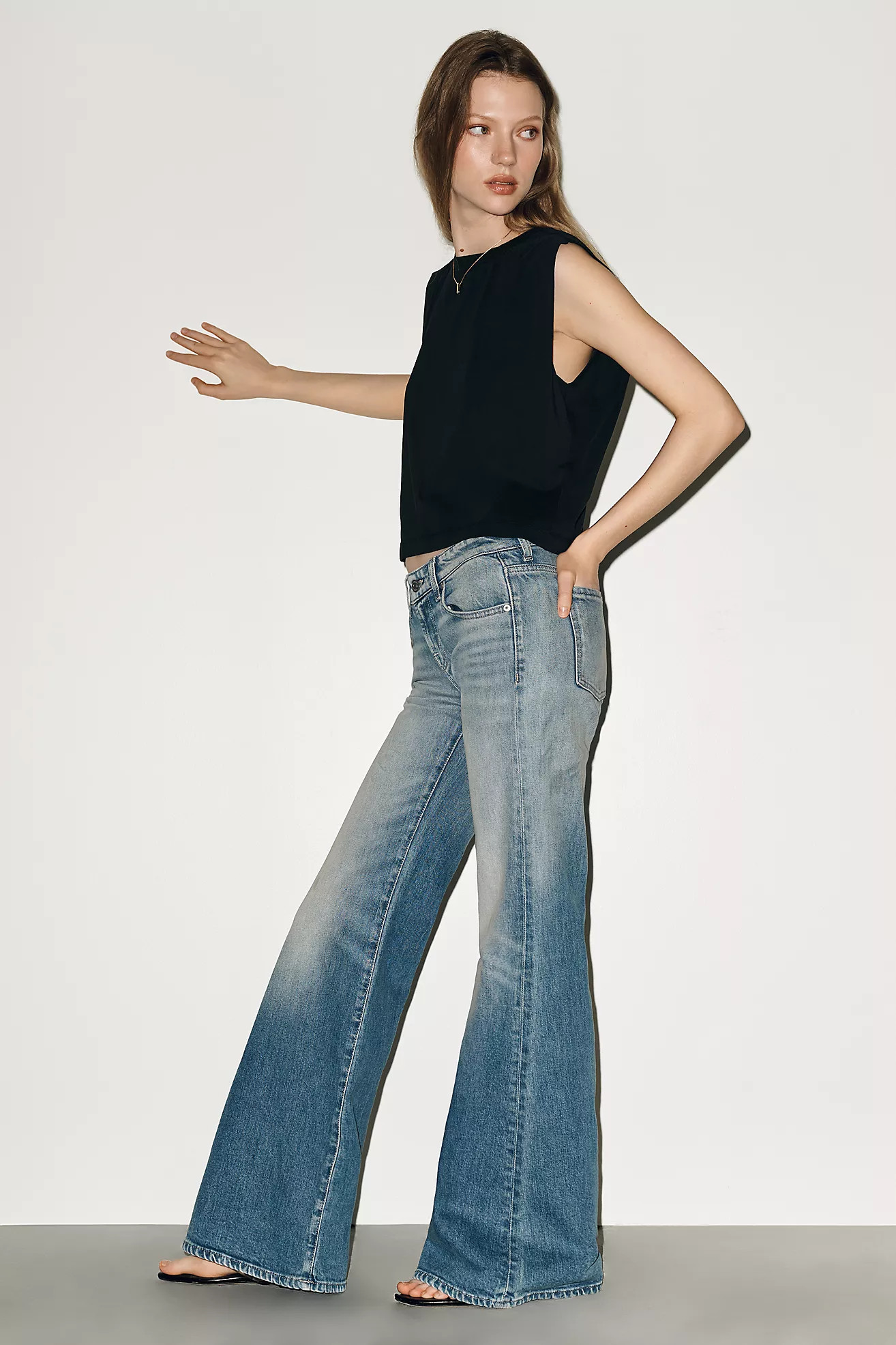 7 For All Mankind Low-Rise Flare Blue Haze Jeans | Anthropologie (US)