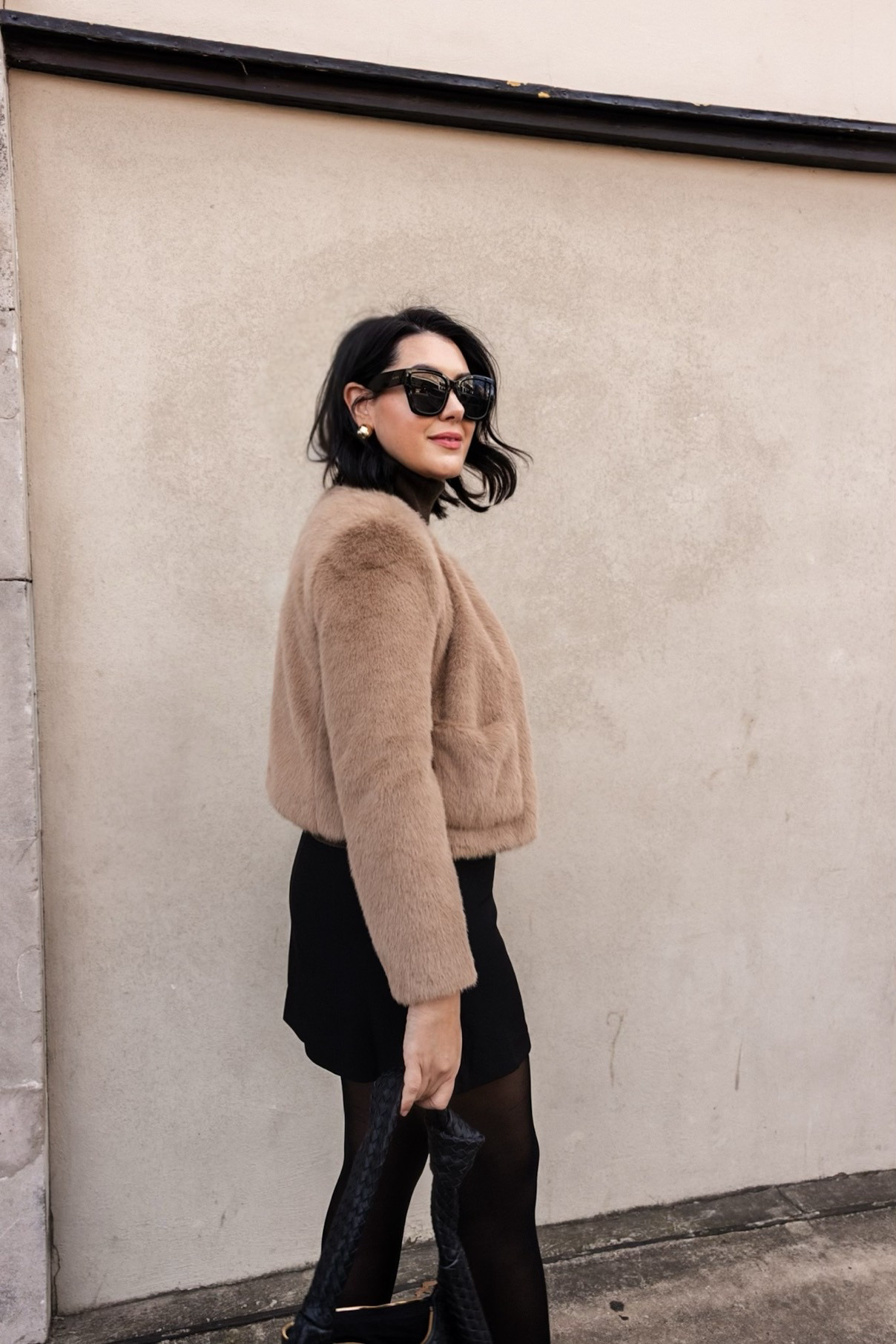 Such a fun winter look with a few classic pieces and then I went full mob wife with the faux fur jacket ;) My turtleneck comes with high recommendations from Quince -- it's under $100 and cashmere! I'm in the large, I like a looser fit. 

I'm in the large of the skirt! Medium of the jacket from J.Crew (it's on sale!)  

 