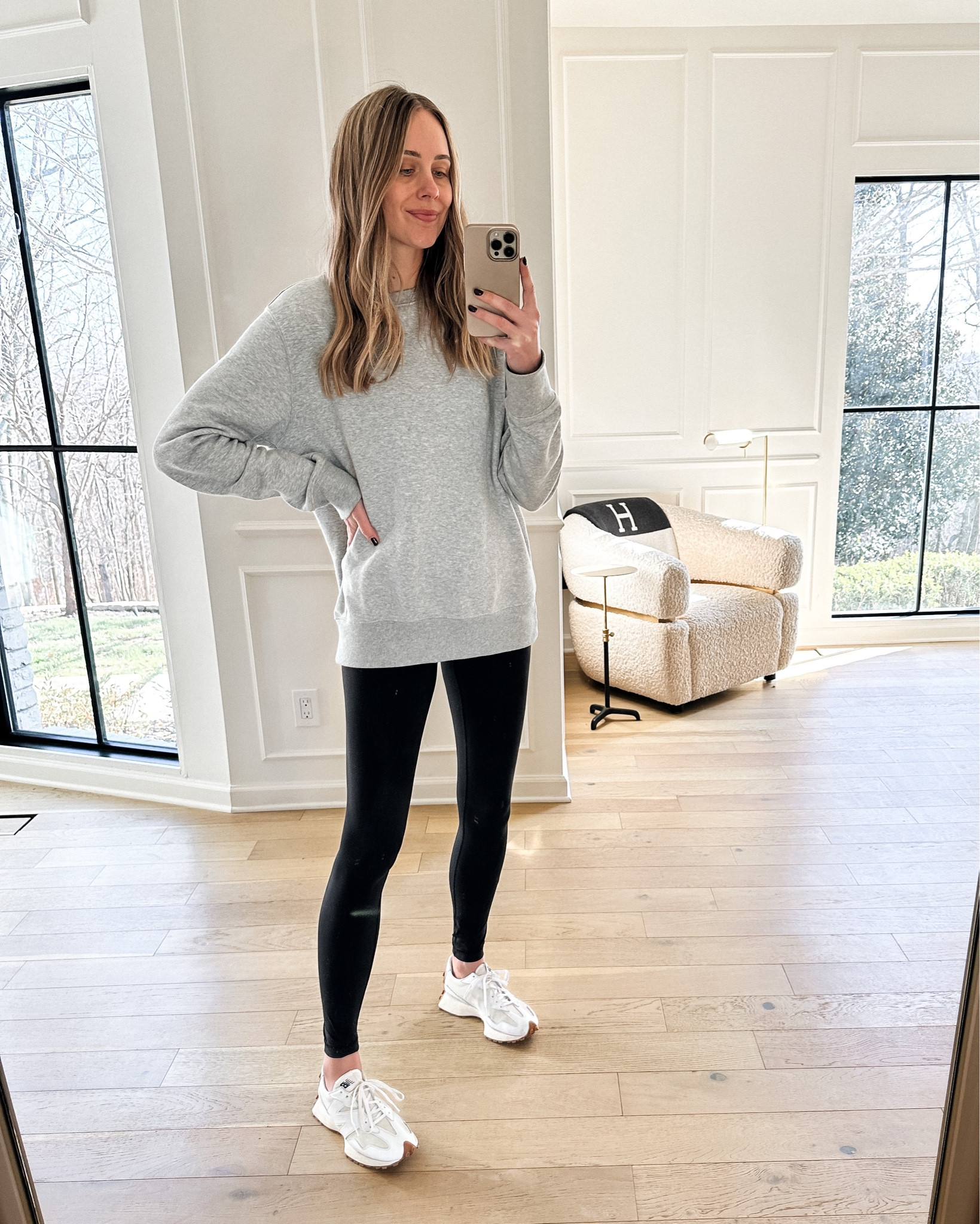 Fashion Jackson wearing oversized grey sweatshirt (M) black lululemon leggings, new balance 327 sneakers 

#LTKshoecrush #LTKstyletip #LTKunder100