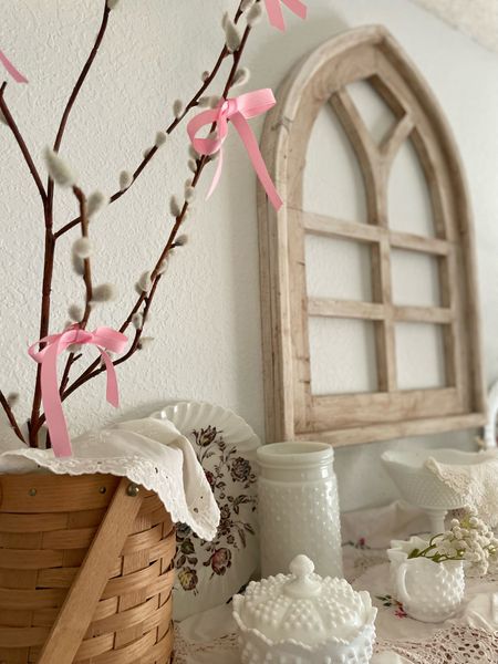 Want to know a super easy and budget friendly way to decorate for Spring?? Add pastel colored ribbons to things like faux stems, knobs or tie around handles. So cheap but so effective in creating a seasonal display on a dime!

#LTKSeasonal #LTKhome #LTKfindsunder50