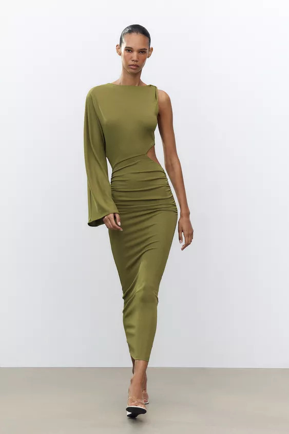 Flowing midi dress with a round neck. Sleeveless and long sleeve options available. Featuring a c... | Zara UK