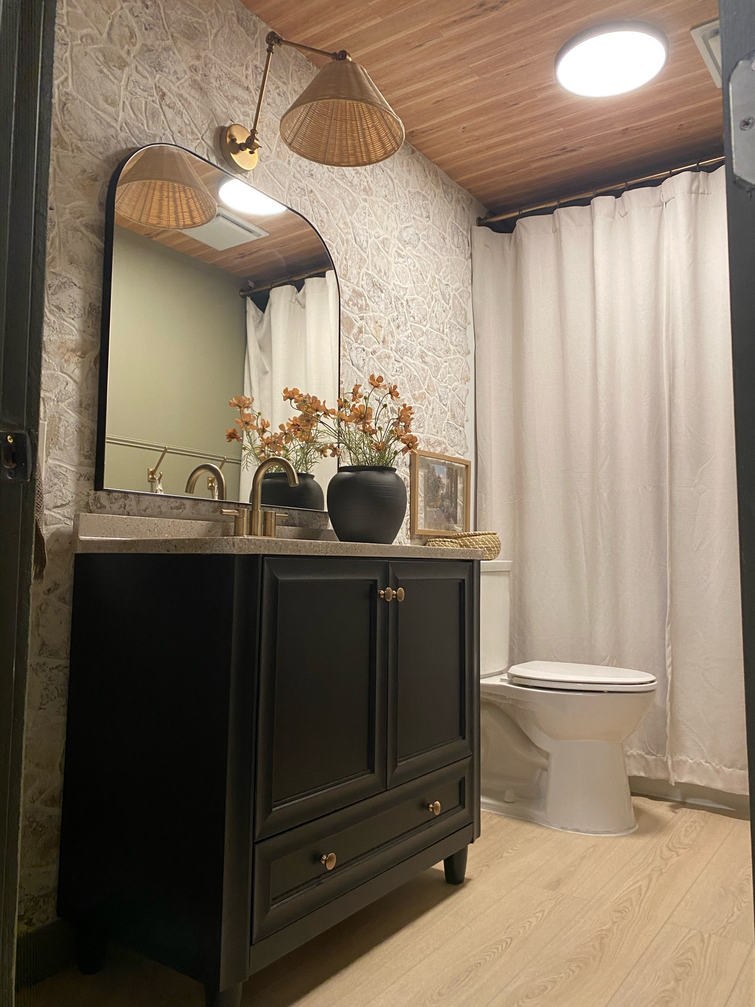 Basement bath sources, brass fixtures, faux rock wall, faux wood ceiling 

#LTKhome