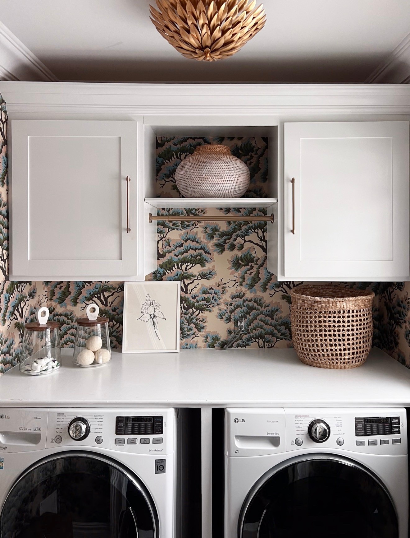 Consider this your sign to hang wallpaper in your laundry room 🙌🏻

Love a bold print in a small space like a laundry room, powder room or closet! Art, canisters, woven basket also linked! 

#LTKmorningroutine #LTKHome #LTKSeasonal