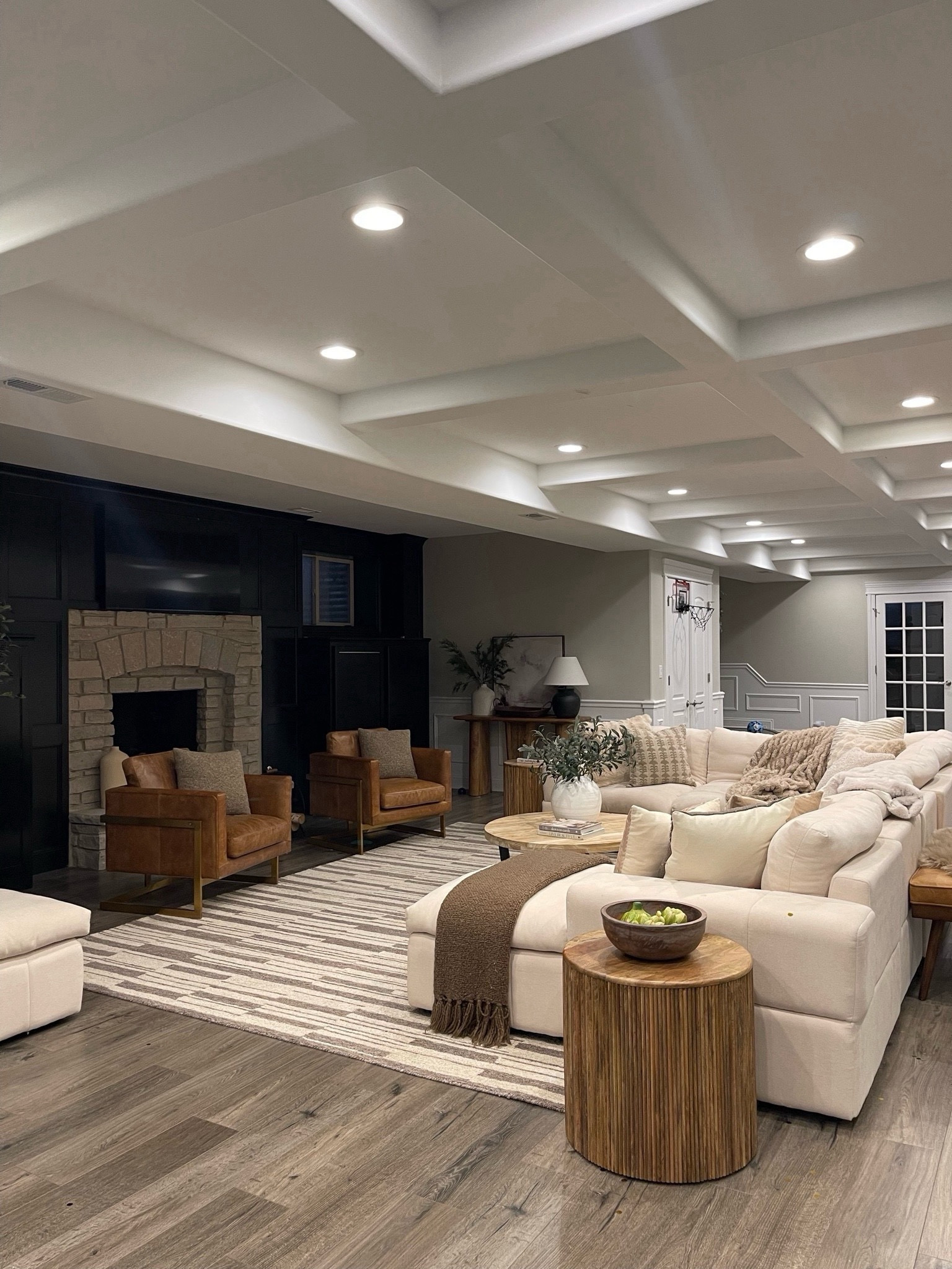 Basement cozy views! Chairs are Edloe and Finch, and coffee table is from Article and cannot be linked. Rug is on sale, and my faux olive tree and favorite designer inspired planter. 

#LTKSaleAlert #LTKHome #LTKxWayfair