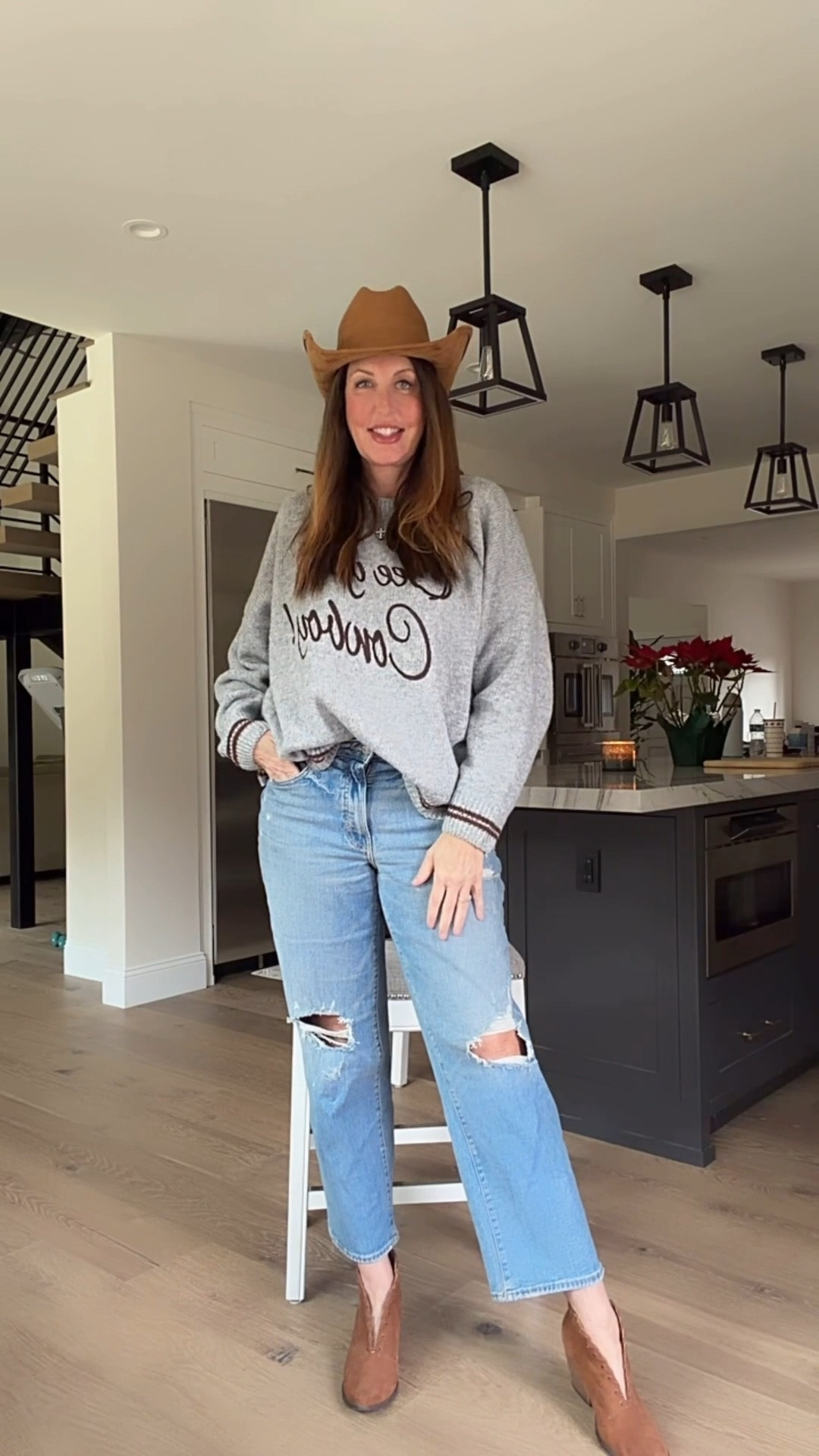 Saddle up, sweetheart—this “See You Cowboy” sweater is giving cute cowgirl on casual duty in the very best way 🤠✨ It’s cozy, oversized, and relaxed, but playful and flirty at the same time. The soft slouchy fit says “I came to chill,” while the “See You Cowboy” lettering says “but don’t forget,  it ain’t always the cowboy.” It runs oversized… I sized down it’s still perfectly roomy. That’s cowgirl magic.
Paired with distressed denim, suede booties, and a classic western hat, this look is comfy-meets-country-chic. It’s the outfit you throw on when you want to feel cute without trying—and still turn heads at the Reno rodeo! 
🌵 Where to wear this comfy cowgirl look:
• Weekend brunch with the girls (bonus points if there’s mimosas)
• Country concerts, rodeos, fairs, or any place with live music and twang
• Casual date nights when you want to look adorable but effortless
• Farmers markets, festive outings, small-town strolls, or cozy errands
• Relaxed days at home when you still want that western sass
It’s comfy, it’s playful, it’s got a little “yee-haw” attitude—and it’s basically saying: “See you, Cowboy.” 🤎🤠

Bailey Rose