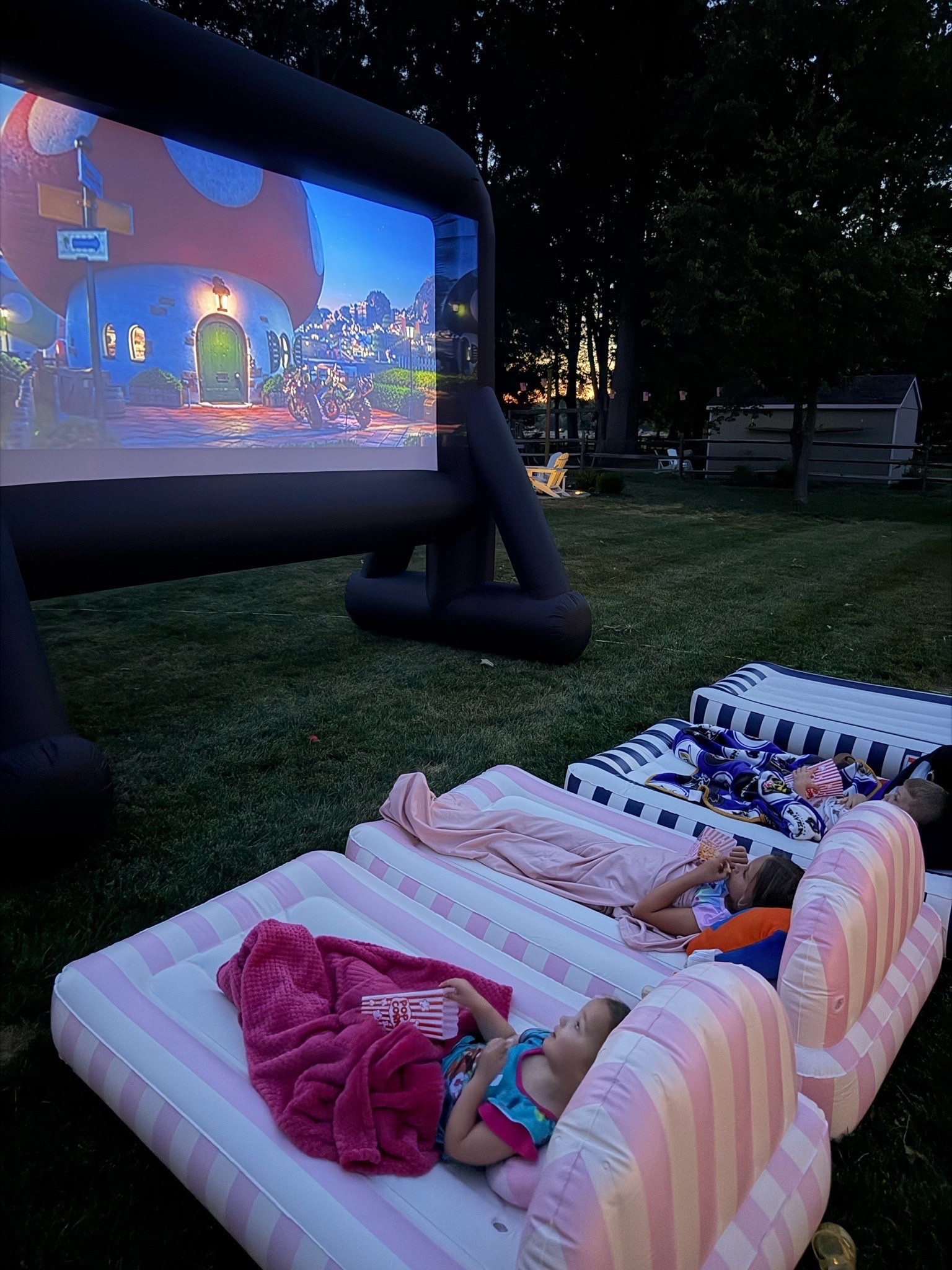 backyard movie night, outdoor movie setup, inflatable movie screen, summer entertaining, outdoor entertaining, backyard ideas, backyard inspiration, family movie night, outdoor living, patio decor, backyard party ideas, summer hosting, outdoor furniture, poolside movie night, cozy backyard, family fun ideas, summer nights, outdoor gathering, home decor inspiration, outdoor lifestyle, striped loungers, backyard setup, hosting essentials, summer aesthetic, outdoor decor, family activities, entertaining at home, backyard makeover, outdoor lounge chairs, summer memories

@FUNBOY  @Target

#LTKHome #LTKKids #LTKmomlife