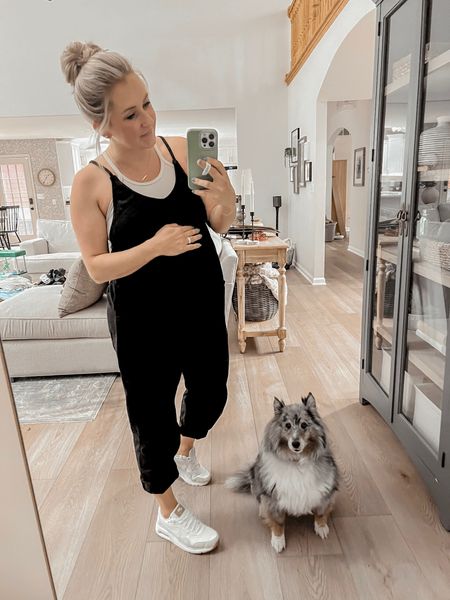 Third trimester bump styling! Comfortable casual maternity jumpsuit hot shot onesie from free people with neutral lifestyle Nike shoes

#LTKshoecrush #LTKbump #LTKstyletip