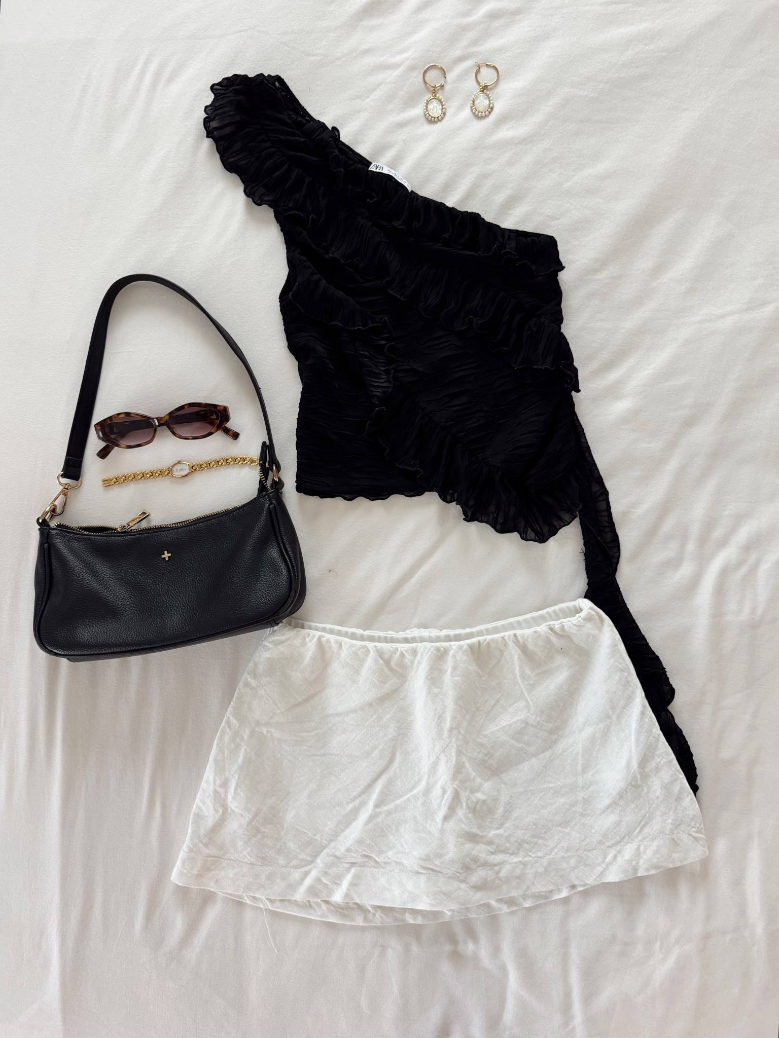 WHAT IM PACKING FOR VACAY🌴 top is old zara- from depop! watch is from a pawn shop- brand is bulova

#LTKSummerEdit #LTKU #LTKSeasonal