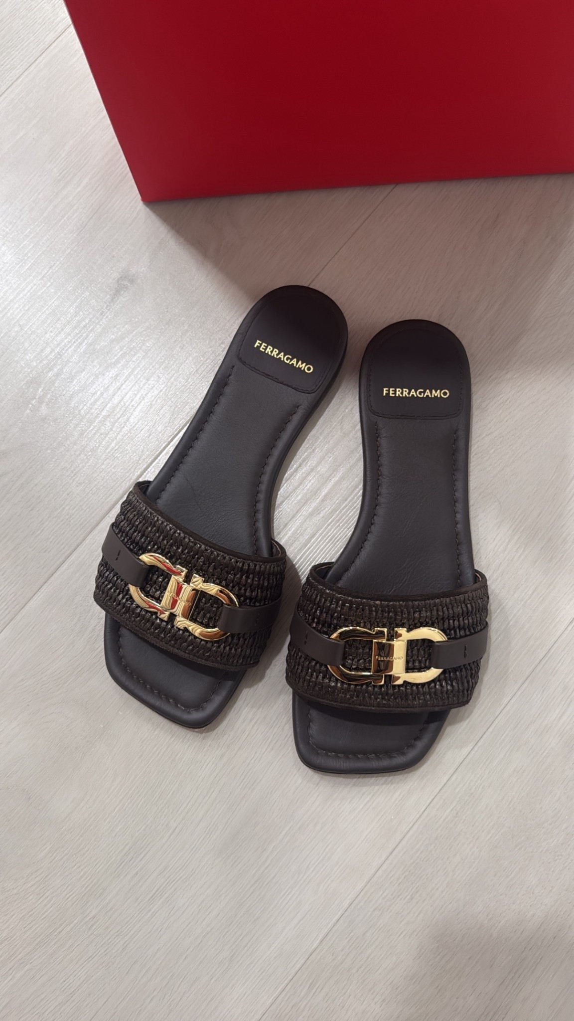 gancini buckle slides from ferragamo  — the perfect staple shoe this summer 👡🖤