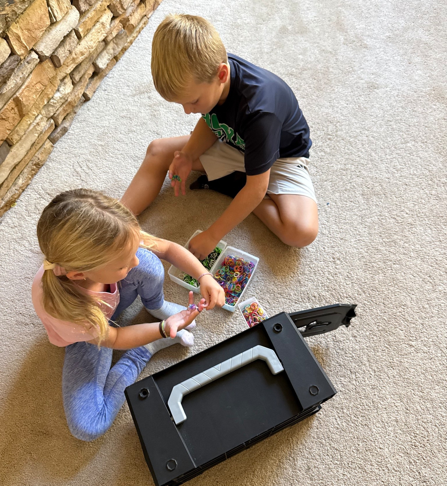 Rubber band bracelet making! Screen-free fun for kiddos! #giftideas #finemotorskills #kidsgifts #giftsforkids

#LTKKids #LTKHoliday #LTKGiftGuide