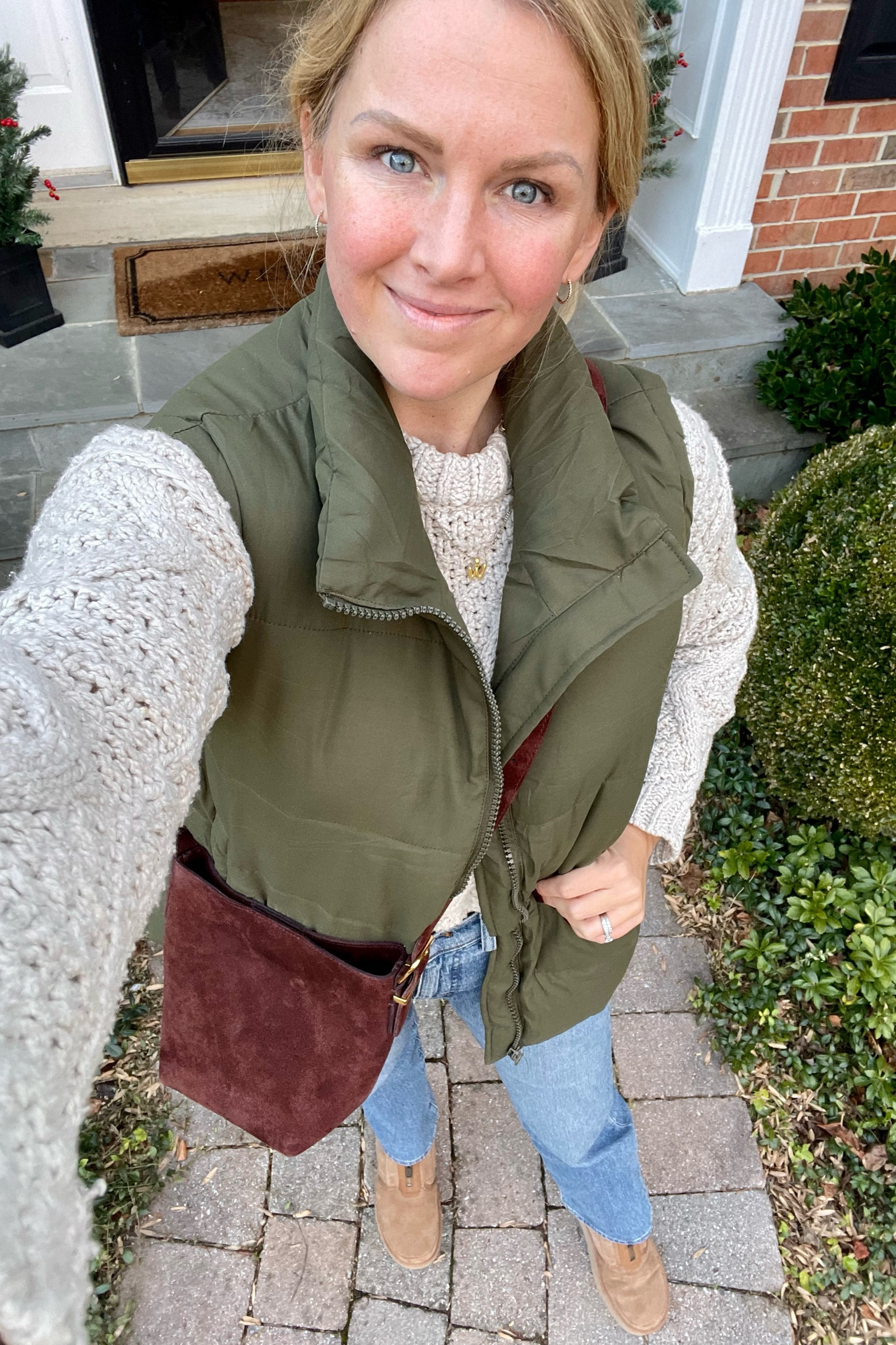 Cozy holiday outfit idea 

Quilted olive green vest is on sale for Cyber week and comes in more colors. I got my normal size

Cableknit cropped sweater fits large. I sized down one

Straight leg jeans are also 50% off for a special Cyber week sale! I sized down one 

Chocolate brown suede crossbody tote is a great holiday gift idea and on sale too!

Holiday weekend ootd, amazon holiday deals, cozy Christmas look

#LTKfindsunder50 #LTKCyberWeek #LTKSeasonal