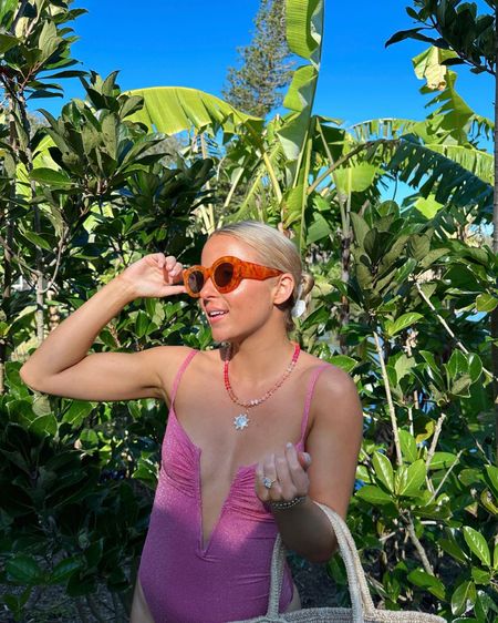 Sparkle swimsuit (true to size, I’m wearing the 2 which fits like an XS & on SALE!) + beachy accessories 🐚 #swimsuit #Revolve #sunglasses #Anthropologie 

#LTKsalealert #LTKswim #LTKSeasonal