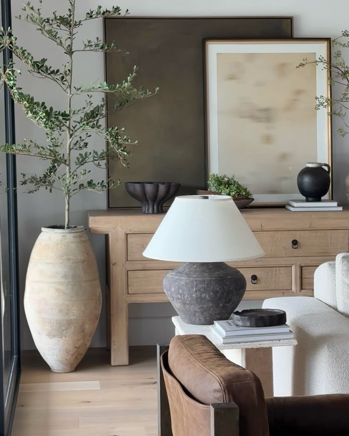just some living room details. 

My sideboard and coffee table are both reclaimed wood, which is my favorite with toddlers, because any mark just adds to the character in my opinion. 

I love using natural fibers when I can, especially in rugs. It shed a bit when we first got it but it’s been over a year now.

I sell olive jars locally to Vegas, but added similar ones