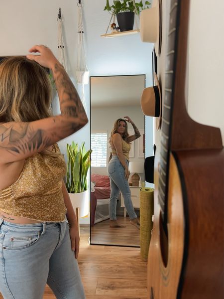 I was feeling myself in this top from Forever 21 💁🏼‍♀️ PSA I’ve tried literally every bra tape or sticky tape you can imagine over the years and NOTHING has worked… until Good Lines. I’m a size D and the hold is incredible! 

jeans, Easter outfit, Spring outfit, vacation outfit, boho home decor, clothing essentials, full length mirror, travel outfit, women’s jeans, mom stylee

#LTKhome #LTKstyletip #LTKmidsize