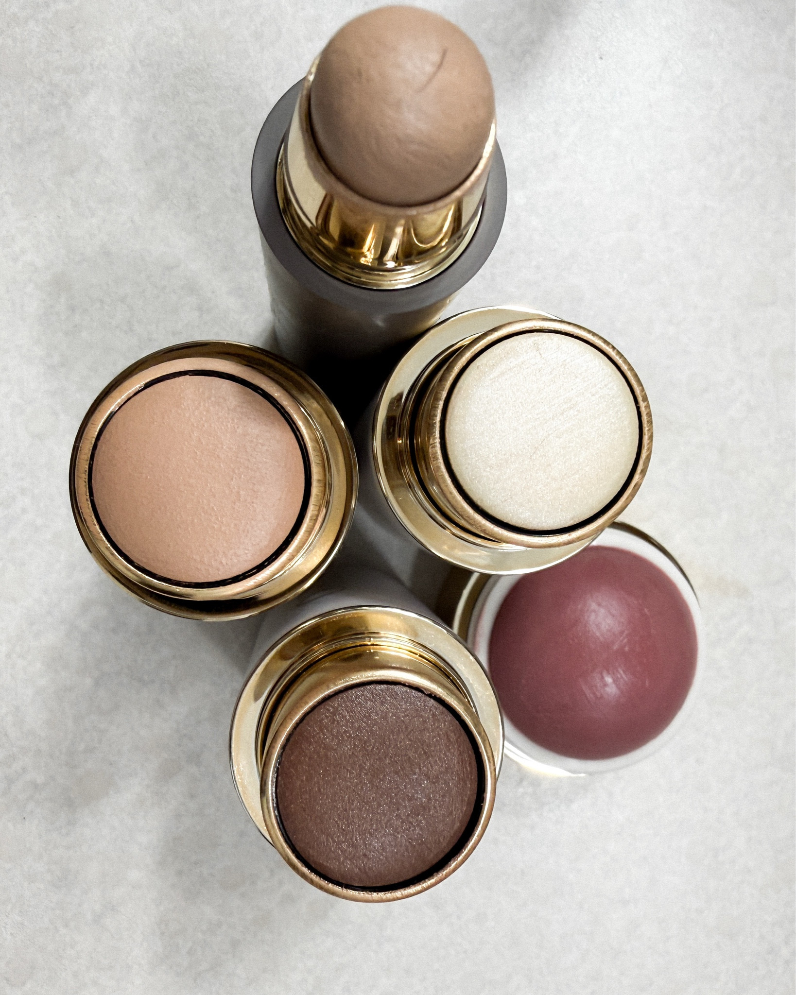 Morning face line up 
Merit complexion stick 
OGEE foundation stick, contour stick, highlight, merit blush 