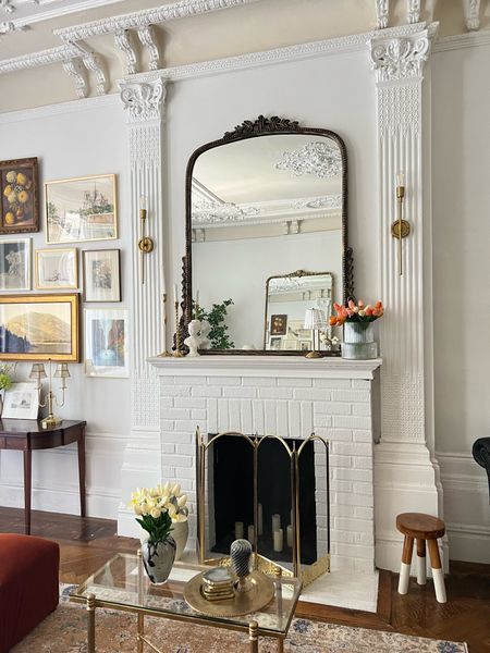 Living room sources- mirror, coffee table, sconces, busy sculpture, gold candle sticks 

#LTKhome #LTKstyletip #LTKFind