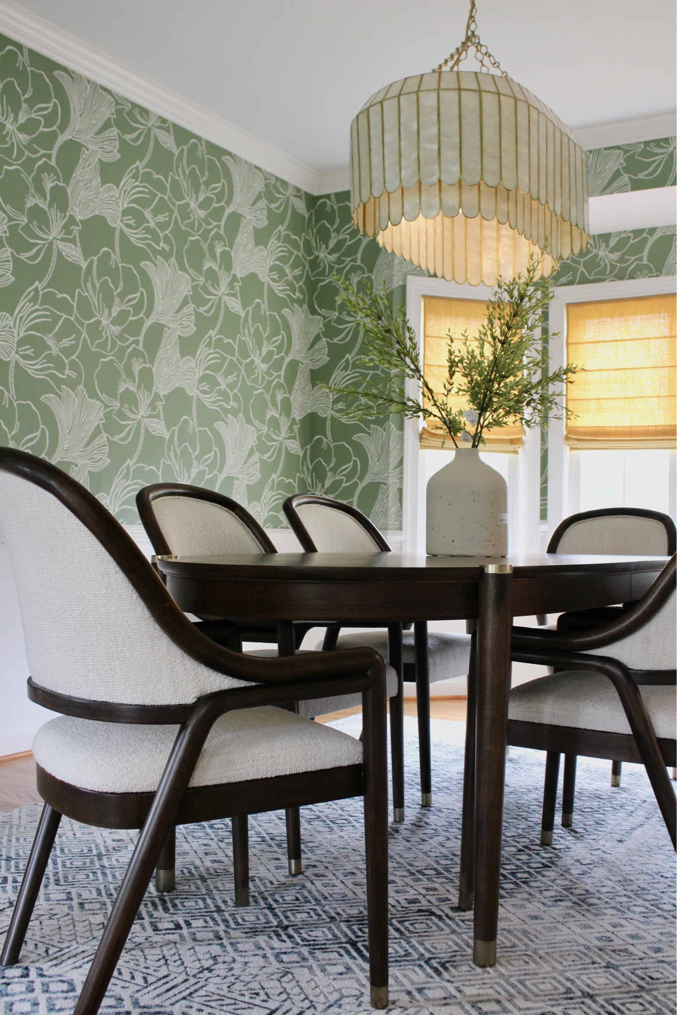 Gorgeous wallpaper available in lots of colors! Oval expanding dining table, washable rug! Stunning capiz chandelier! 

#LTKhome #LTKunder100