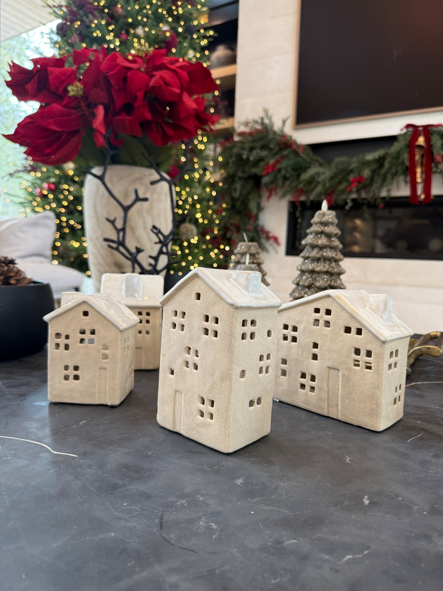How cute is this set of ceramic houses? You could style these anywhere. They have an opening for a tea light candle in the back.

#LTKHoliday #LTKSeasonal #LTKHome