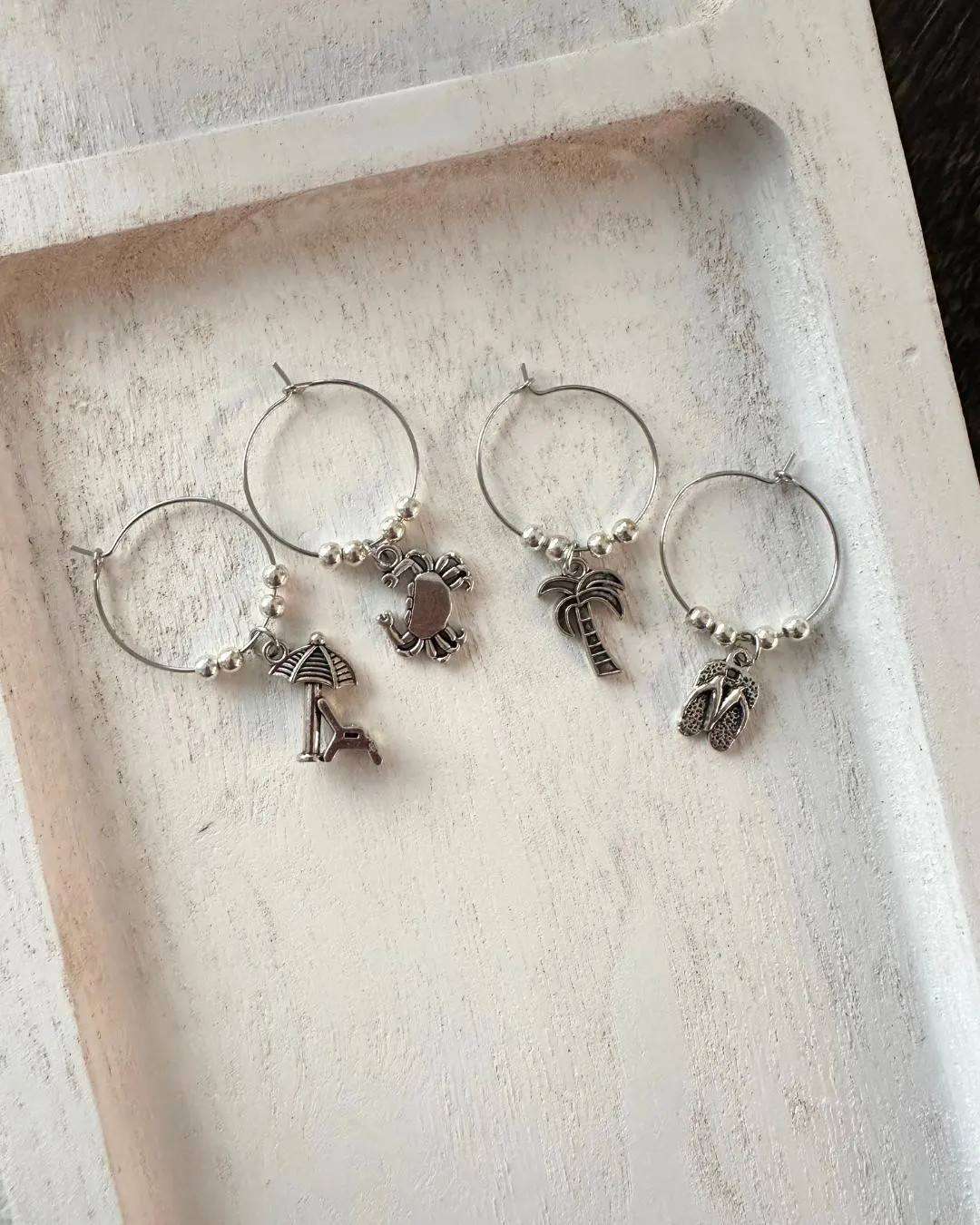 Use these ADORABLE silver beach wine glass charms for your next girls night, bachelorette party, or even as a housewarming gift! Use code YASPLEASE for $1 off your next order!

#LTKfoodie #LTKHome #LTKWedding