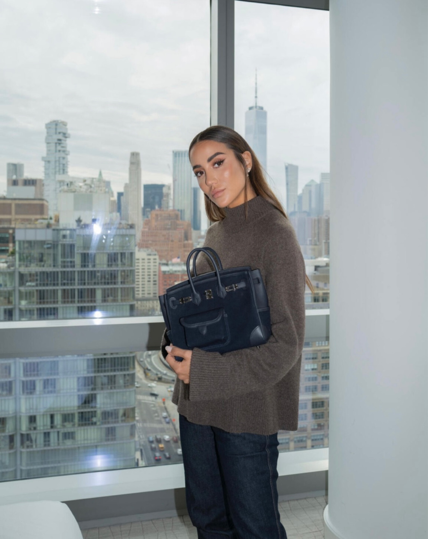 A close up of the Birkin Cargo Cloth Handbag for Fashion Week 

#LTKtravel