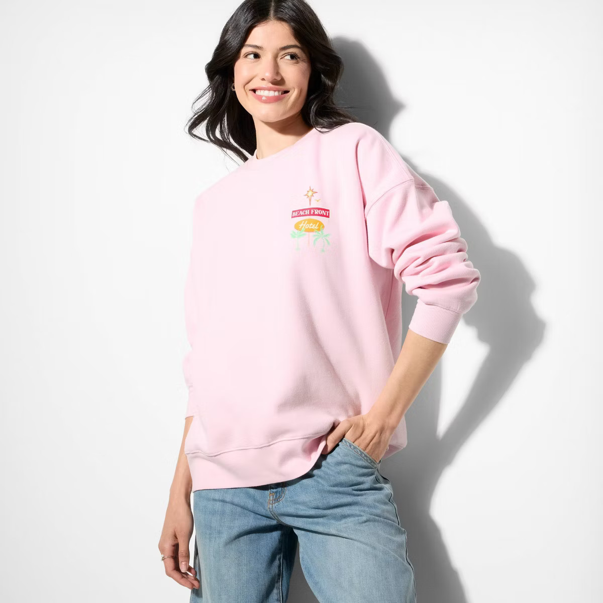 Women's Oversized Graphic Pullover Sweatshirt - Wild Fable™ Cream XS | Target