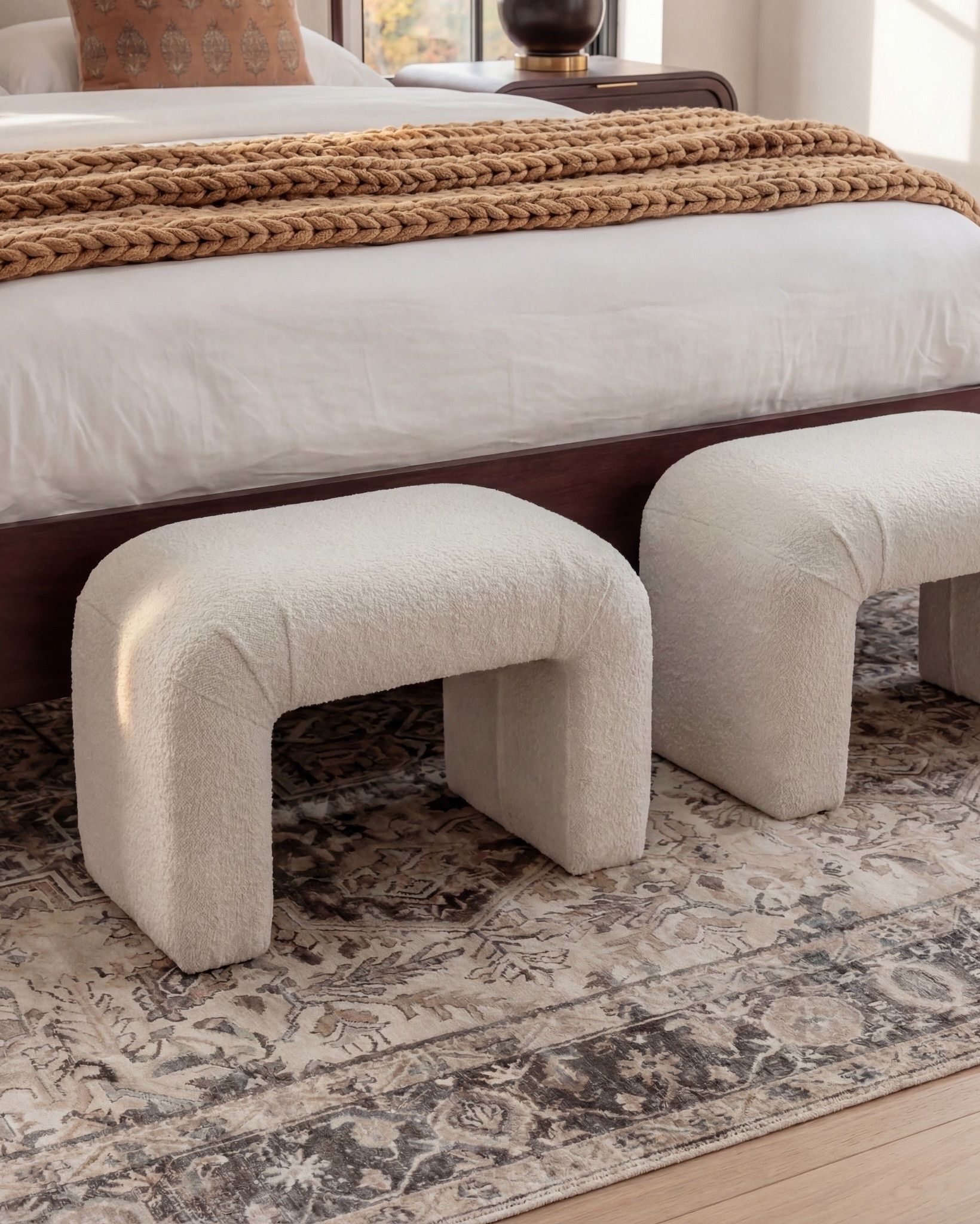Furniture & Decor
	•	Upholstered wood bed frame (cream fabric)
	•	White bedding set
	•	Chunky knit throw (camel)
	•	Patterned accent pillows (rust/brown)
	•	Wood nightstands
	•	Ceramic table lamps (black base, white shade)
	•	Curved brass-framed wall mirror
	•	Framed floral wall art above bed
	•	Upholstered boucle bench stools (set of two)
	•	Vintage-style area rug (neutral pattern)
	•	Wood dresser with brass corner details
	•	Decorative ceramic vase
	•	Stacked neutral books
	•	Brass decorative tray
	•	Sculptural brass object
	•	Framed artwork above dresser
	•	Exposed wood ceiling beams
#LTKSaleAlert #LTKFindsUnder100

#LTKsale #LTKhome